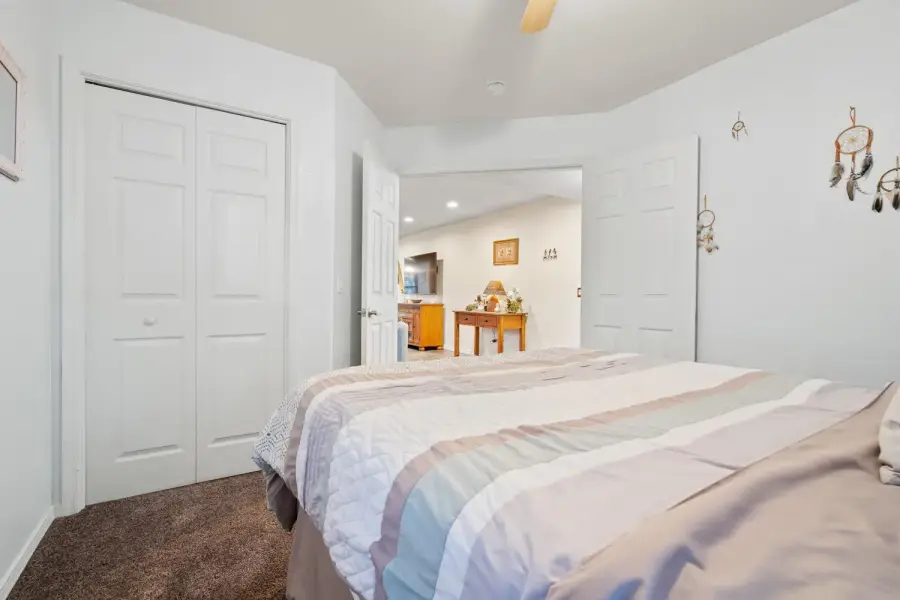 Bedroom #3 is just off the living room with french doors